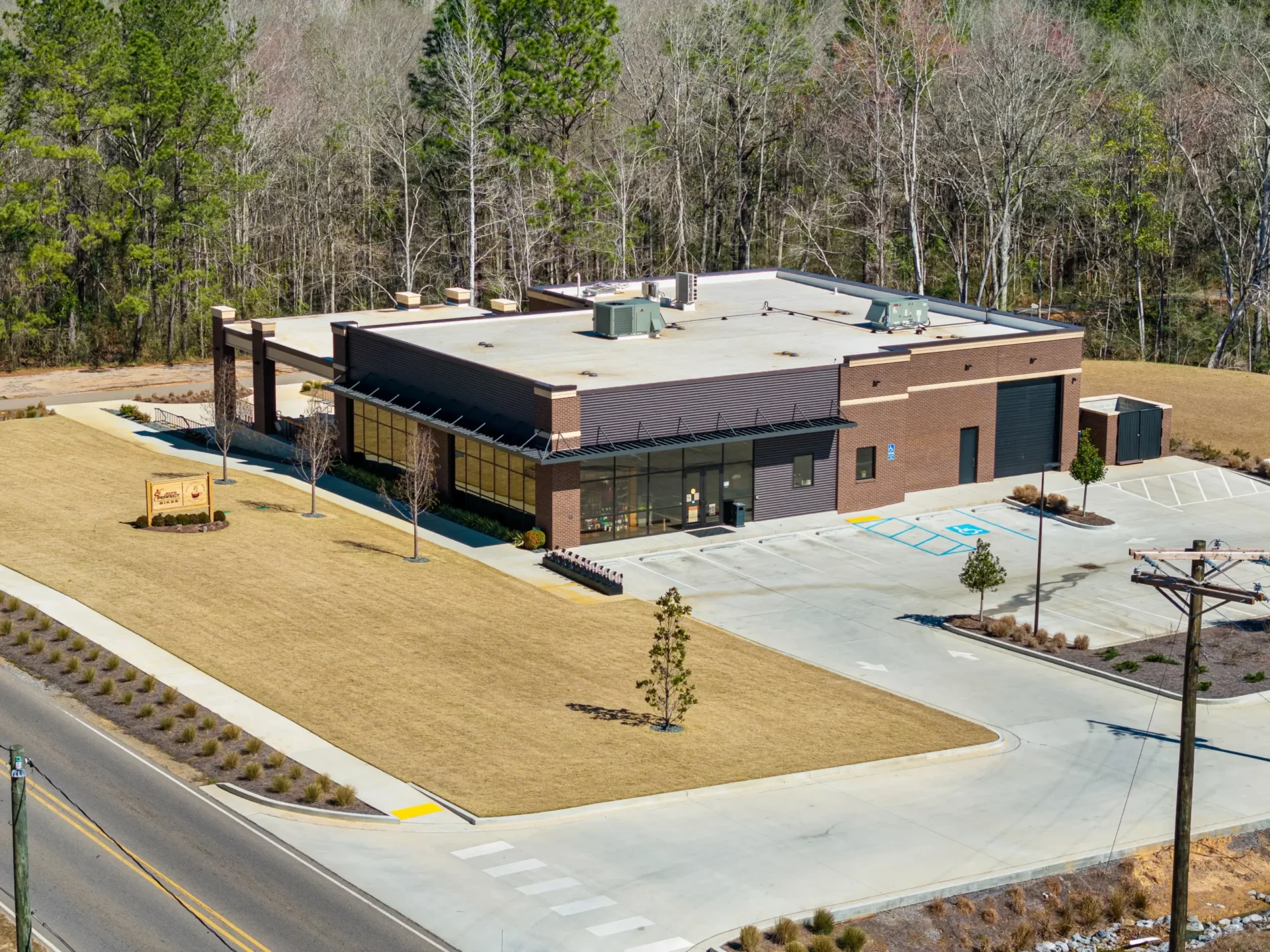 aerial view of modern building and parking lot